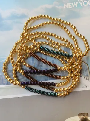 Gold beaded with tornasol colored center