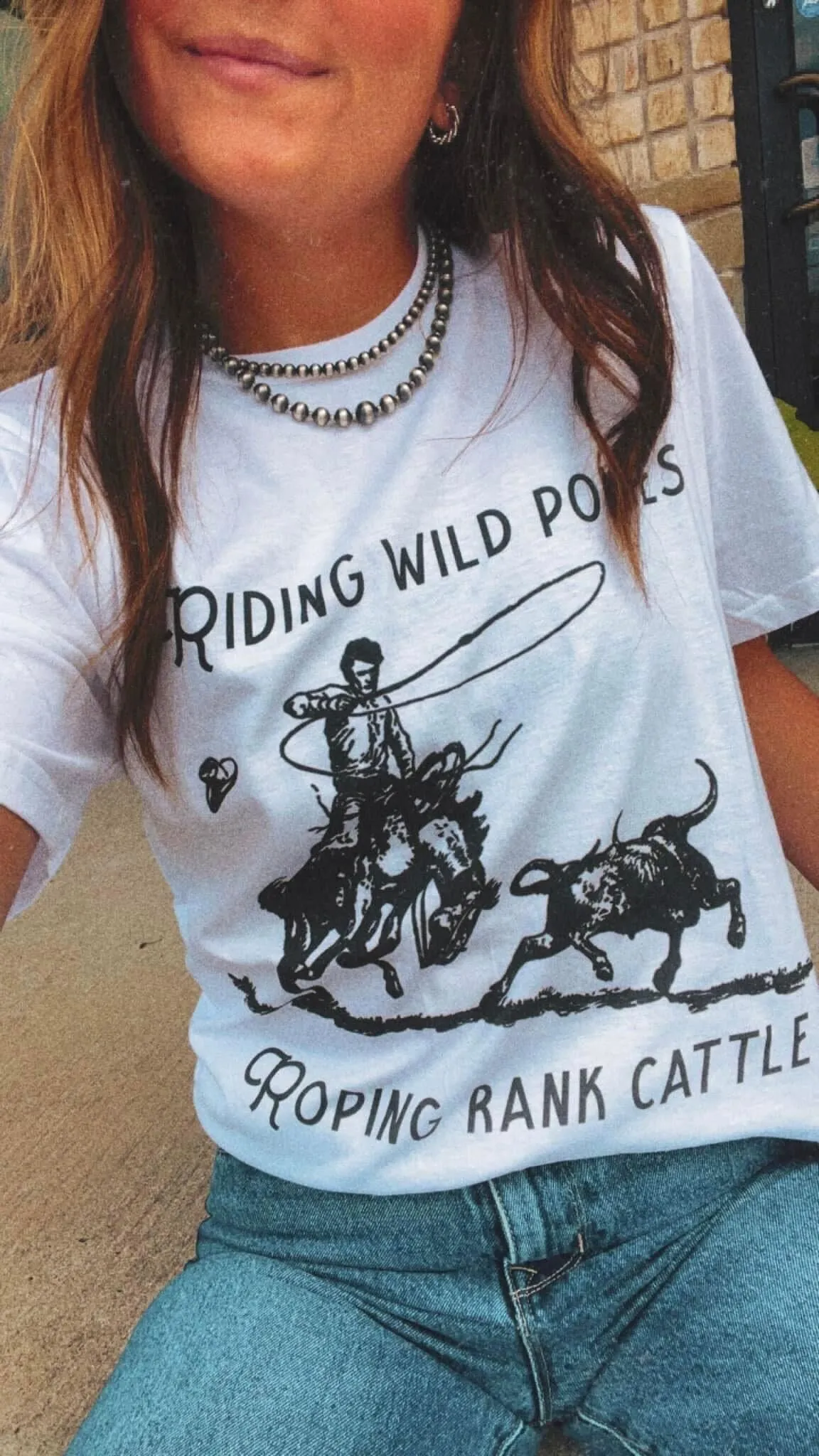 Riding Wild Ponies Graphic Tee